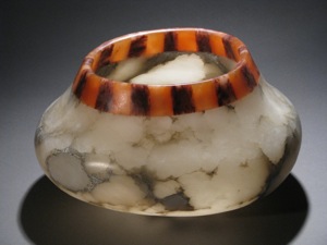Medium Temple Bowl of white, orange, and agate red Alabaster stone.